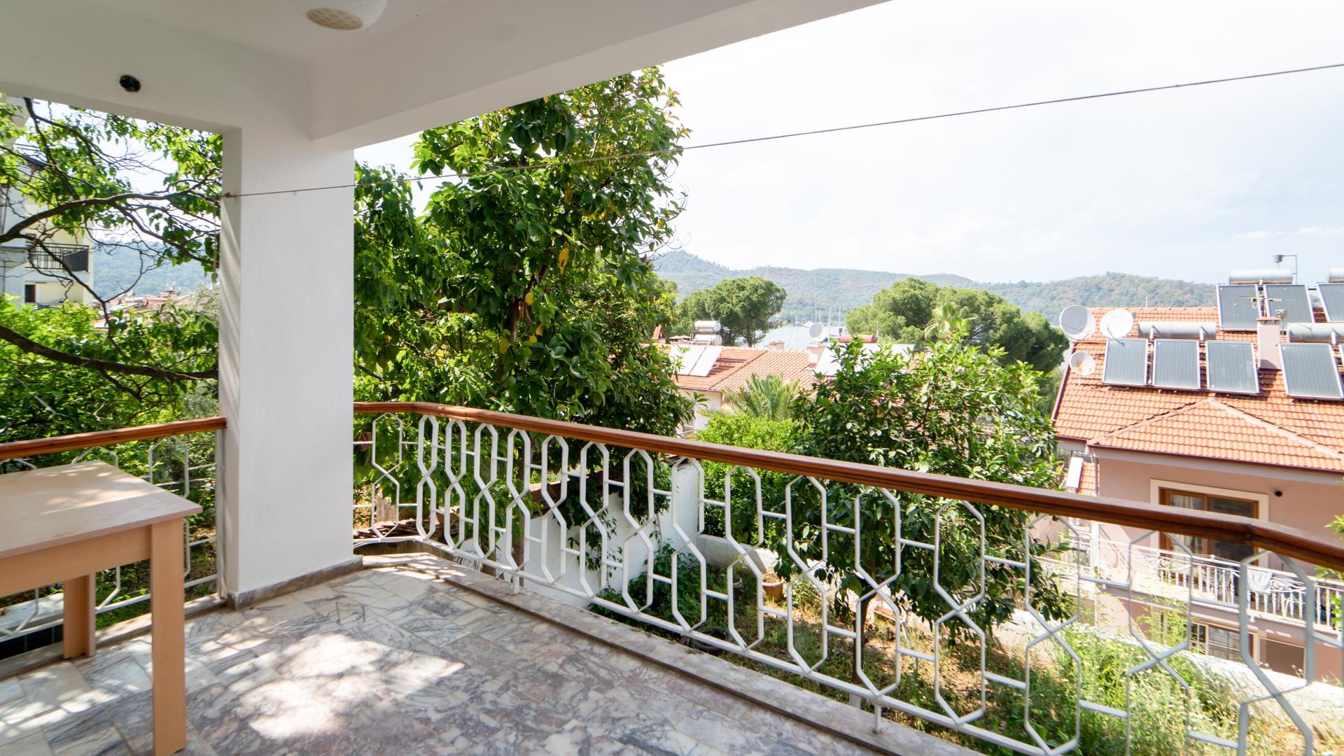 Enjoy morning coffee or evening drinks on our house's balcony, while admiring the captivating nature views.