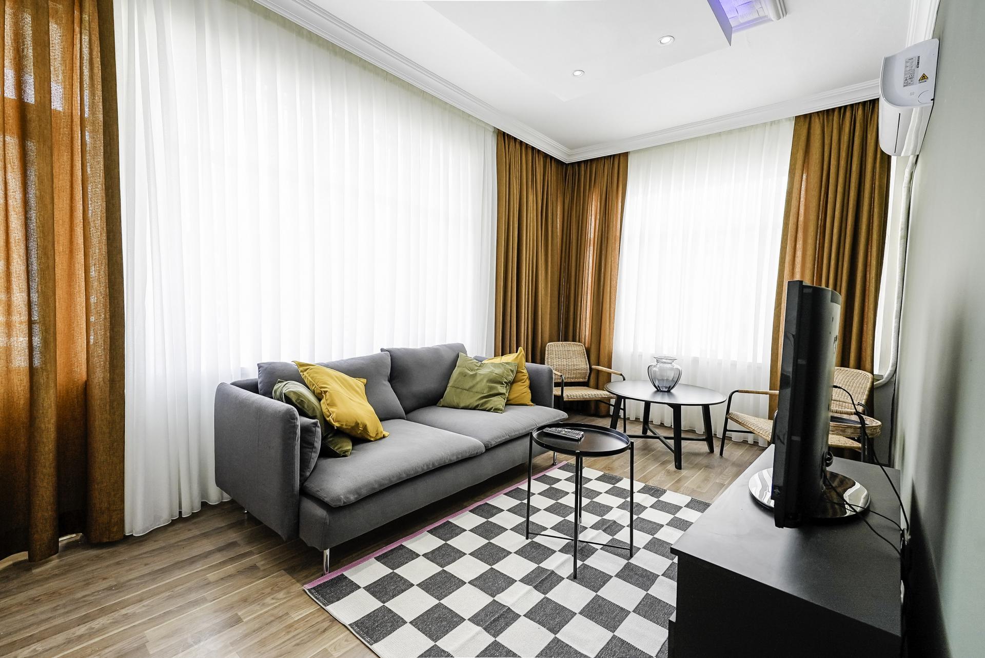 Our elegantly appointed living room is the ideal place to unwind or entertain guests.