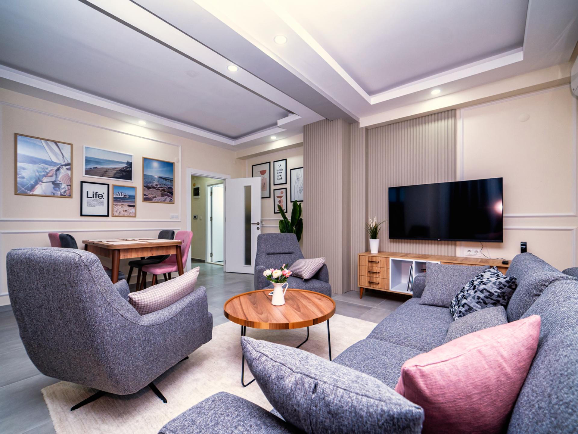 Experience the essence of coziness in our inviting and spacious living room.
