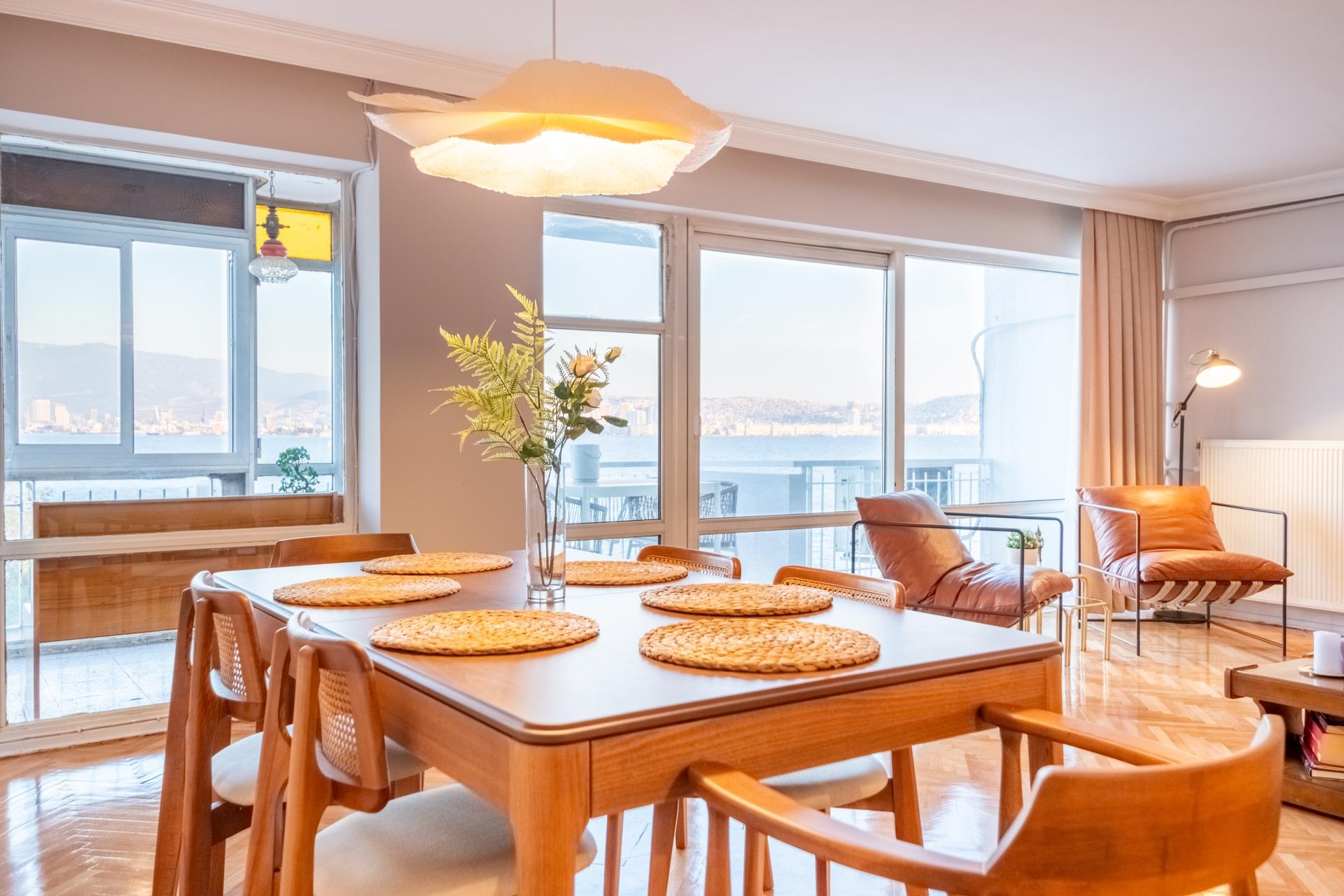  You can enjoy delicious meals with your loved ones at the large dining table in the room.