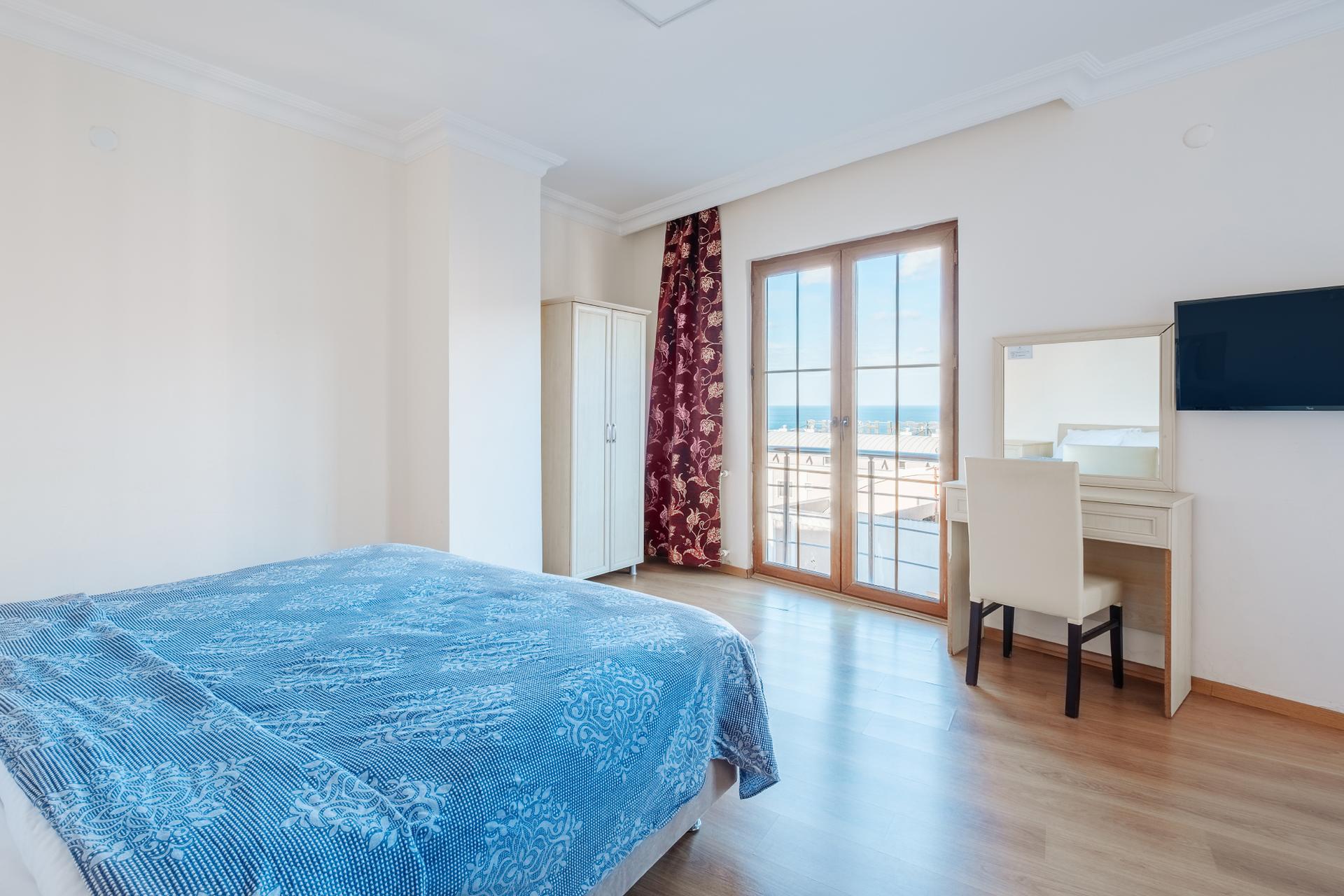 Wake up to the serene beauty of endless blue waters from the comfort of your luxurious sea view room.