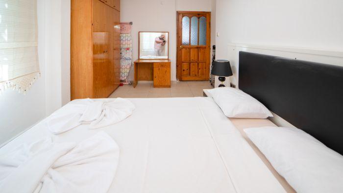 Relax and unwind in the comfort of our stylish and spacious bedroom.