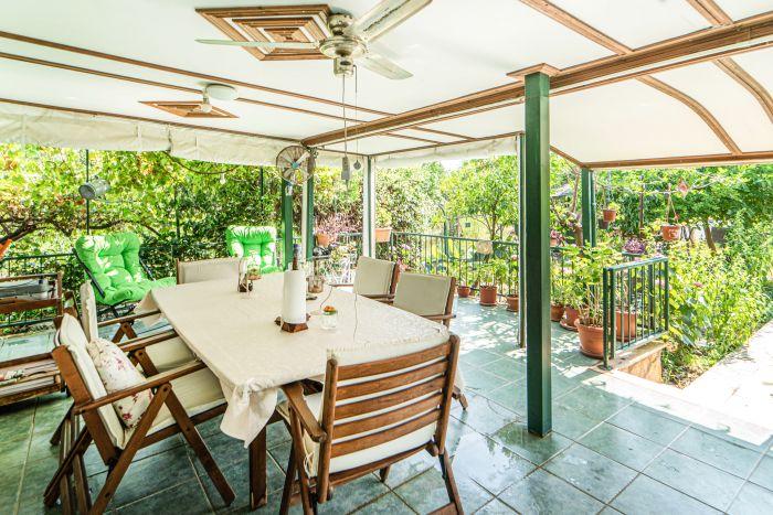 Enjoy the outdoor living at its finest in this charming and comfortable patio.