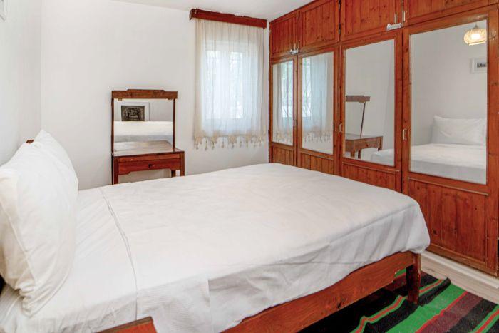 Retreat to our serene and beautifully decorated bedroom for a peaceful getaway.