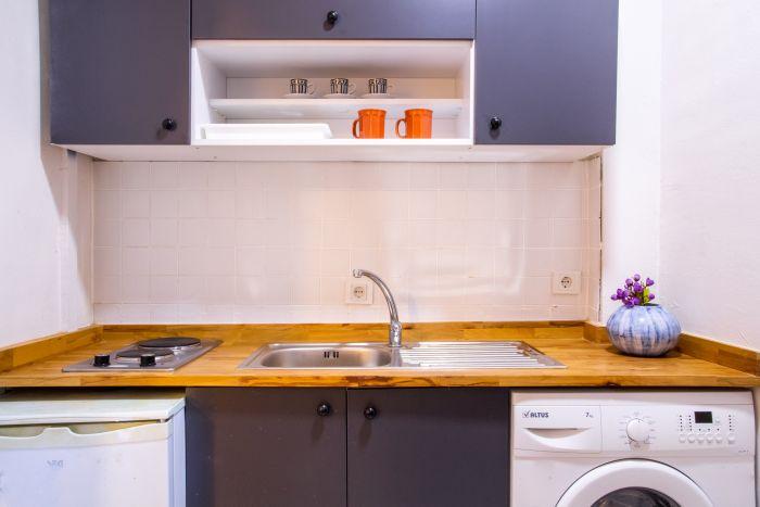 Our cozy and compact kitchen has all the necessary appliances and utensils.