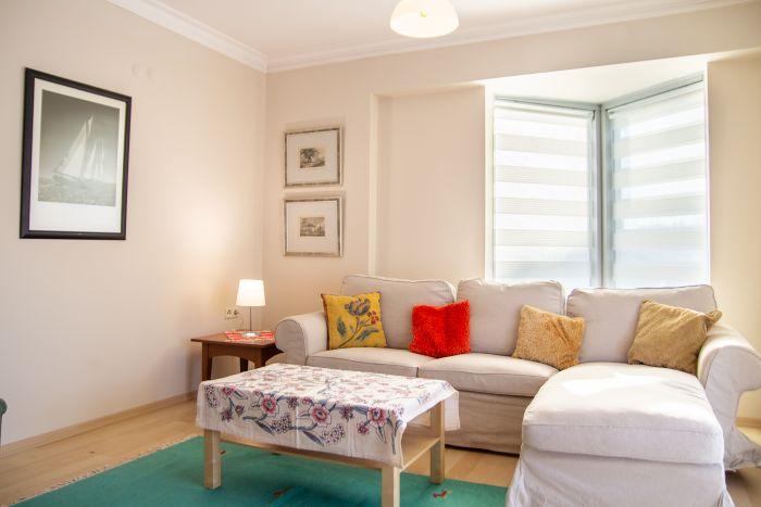 A tastefully furnished living room awaits you.