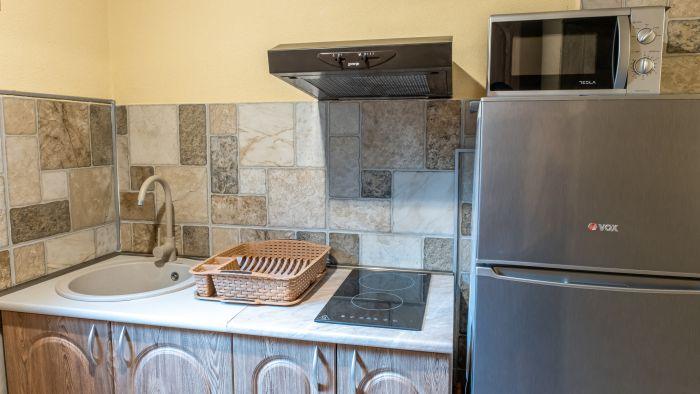 Our kitchen is well equipped with modern appliances.