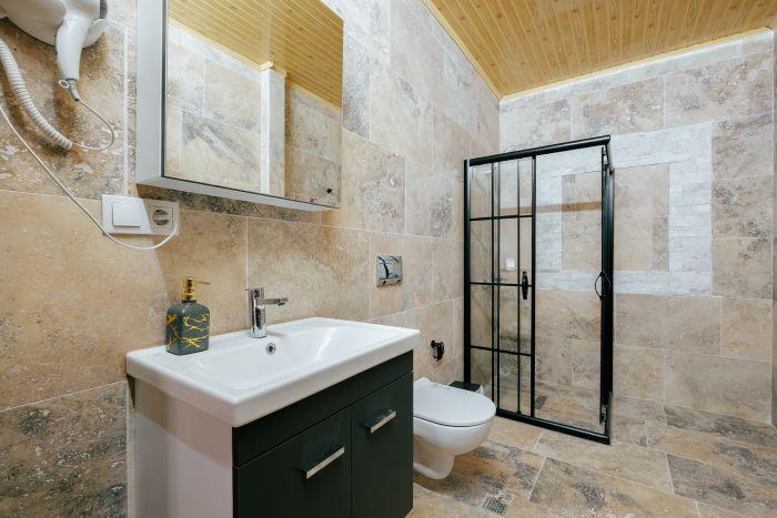 Sleek and Modern Bathroom Oasis with Minimalist Design and Spa-like Ambiance.
