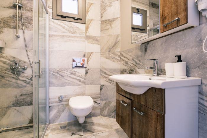 Refresh and rejuvenate in our modern and stylish bathroom, complete with upscale amenities.