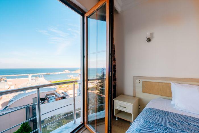 The sea, your serene neighbor, visible from the comfort of your room.