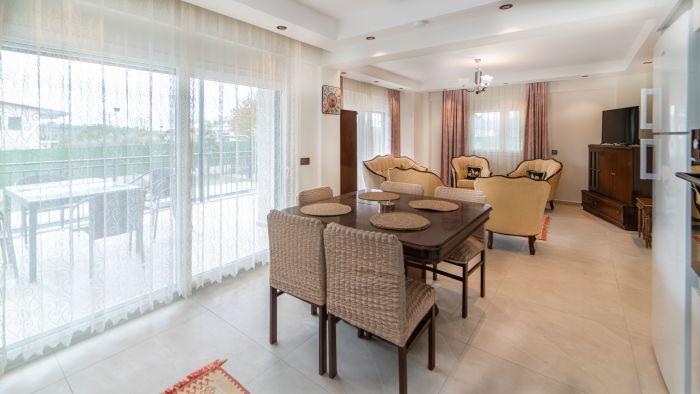 Relax in style and comfort in our spacious and elegantly furnished living room.