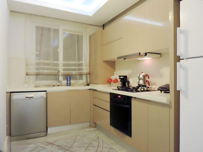 All necessary white appliances and utensils are provided in our bright kitchen.
