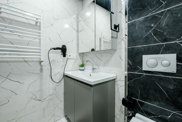 Refresh and rejuvenate in our chic, modern bathroom.