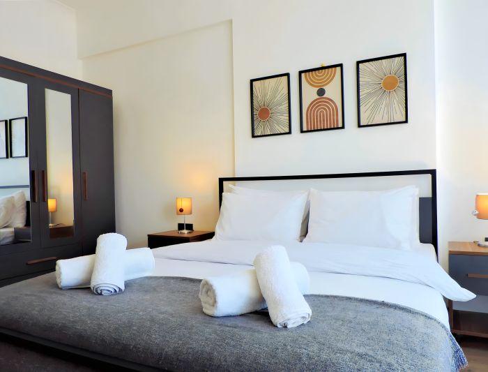 Experience a restful night's sleep in our cozy and inviting bedroom.