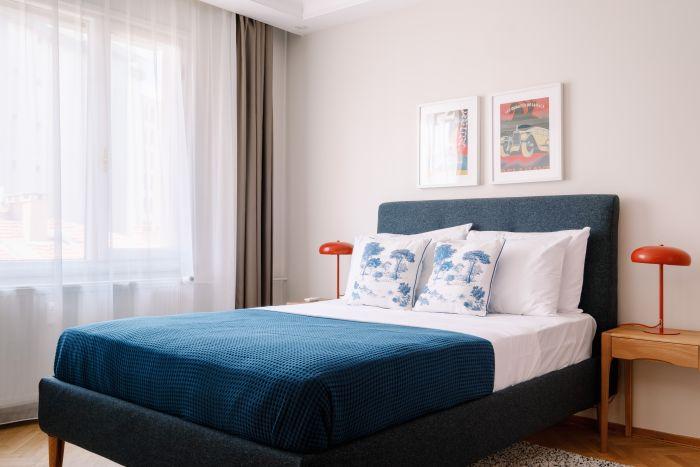 Indulge in luxury and comfort in our stylish bedroom with a queen-size double bed.