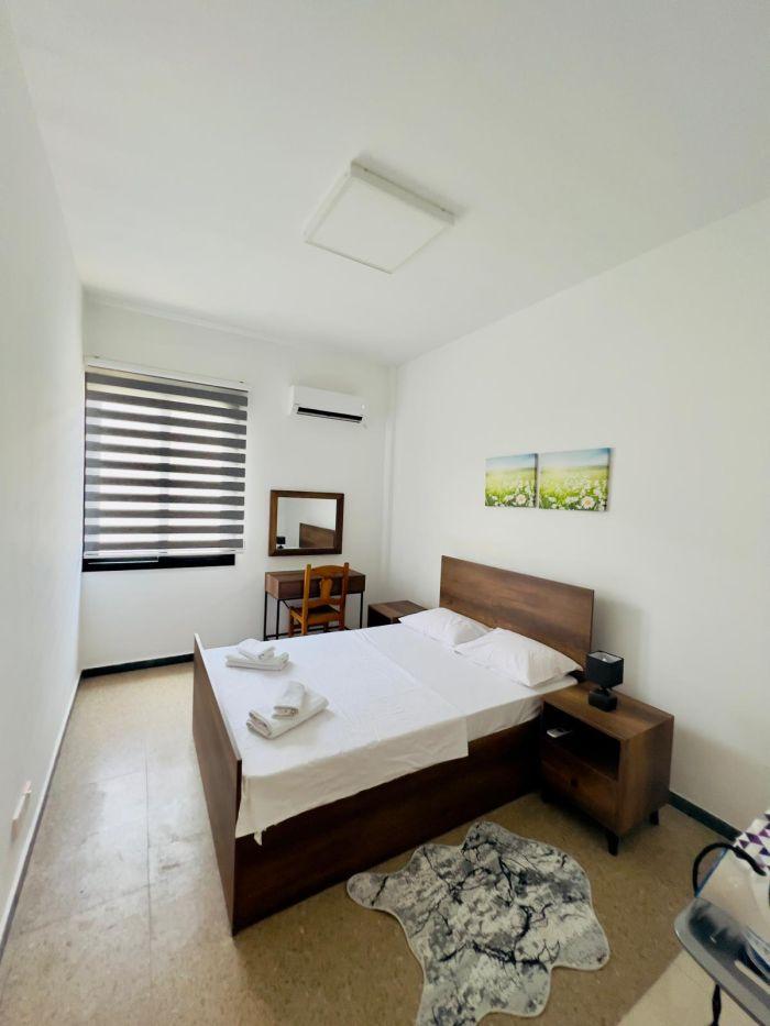 Retreat to our serene and beautifully decorated bedroom for a peaceful getaway.