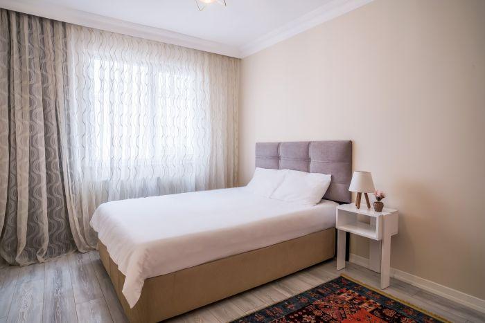 The main bedroom offers a double bed and ample space for your belongings.