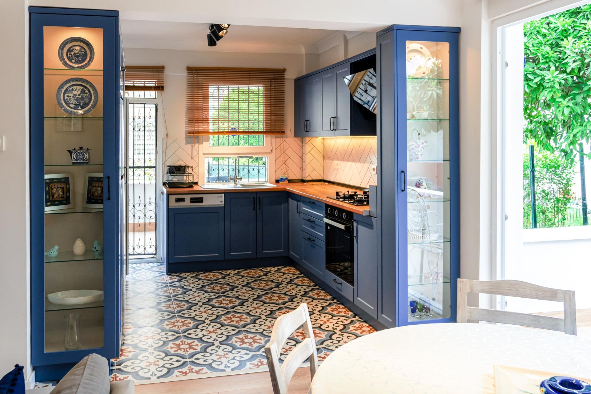 Our stylish American-style kitchen with blue tones and authentic mosaic tiles…