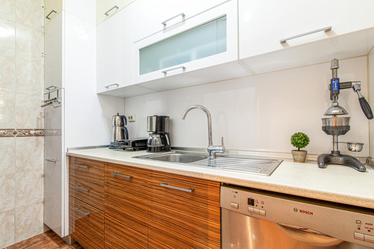 The kitchen is fully equipped with top-notch white goods and appliances.
