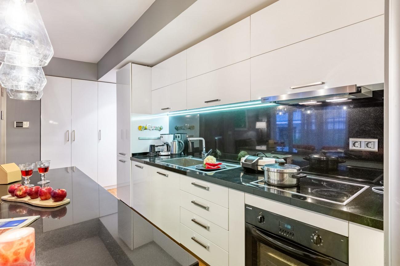 The kitchen is fully equipped with state-of-the-art white goods and appliances.