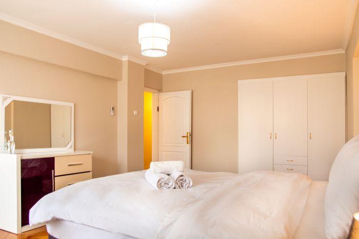 A large closet, a vanity table and a comfortable double bed, everything is ready for your comfort.