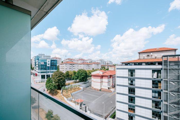 Our flat features a balcony where you can enjoy city view. 