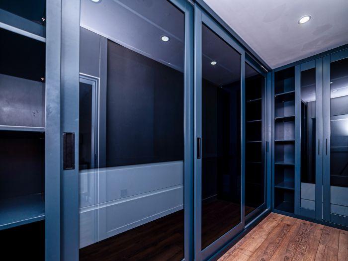 You can place your belongings in the spacious wardrobe here. Isn't it great?