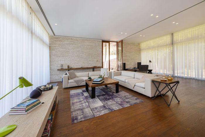 The living room adopts a modern and inviting design.