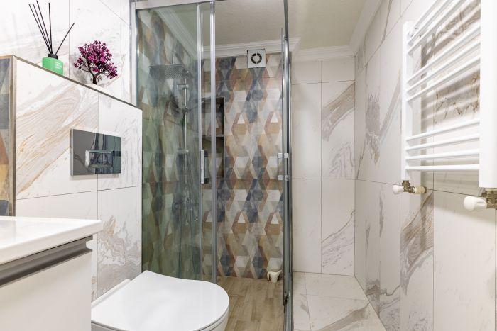 Start your day right with a revitalizing shower in our bathroom.