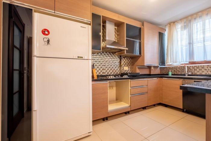 Our kitchen is fully equipped with modern appliances.