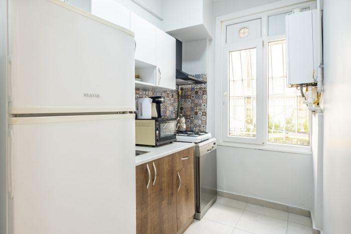 Our kitchen is fully equipped with modern appliances.