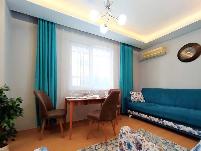 AC is also available in our living room, a heat-proof stay awaits you in Antalya.
