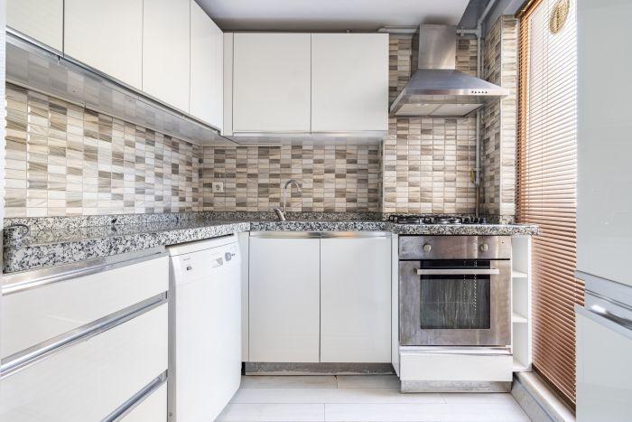 The kitchen is fully equipped with top-notch white goods and appliances.