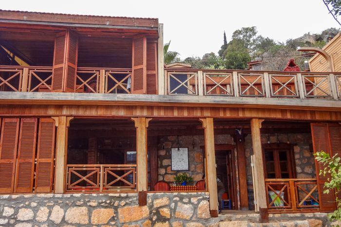 This stunning villa is designed with wooden details and stones to blend in with the island's natural surroundings.