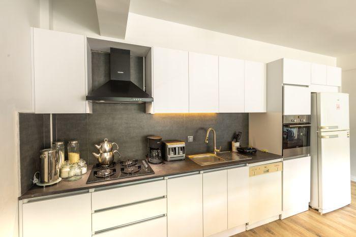The open-plan design of our kitchen allows for easy flow during meal preparation and serving.