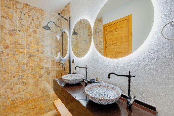 The modern-designed bathroom will fulfill your expectations about hygiene.