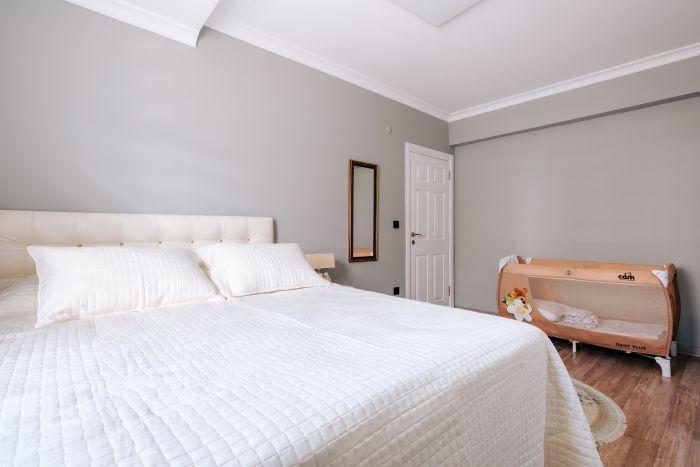 This comfy bedroom lets you sleep like an angel.