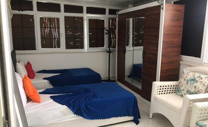 The fourth comfortable bedroom includes 2 single beds.