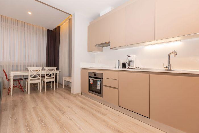 The kitchen is well equipped with top-notch white goods and appliances.