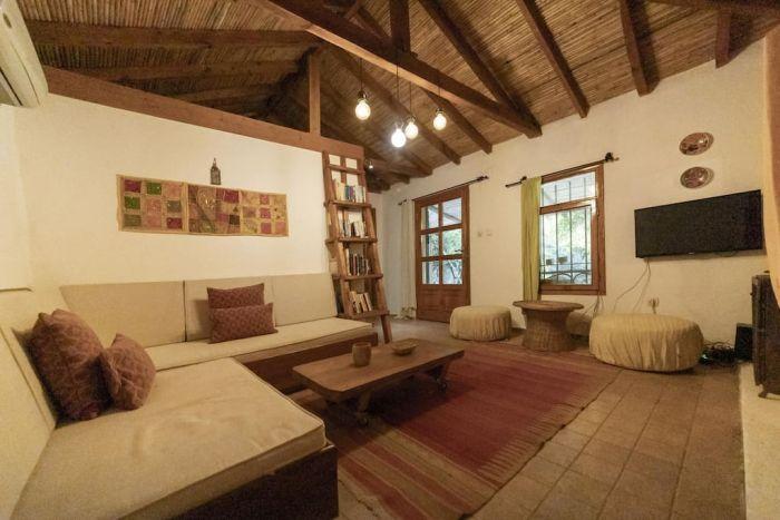 Nomadic style interior with an ethnic rustic mix.