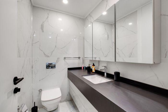 The modern-designed bathroom will fulfill your expectations about hygiene.