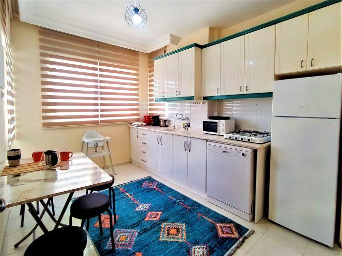 The kitchen has a large space, a balcony and all the appliances you will need.