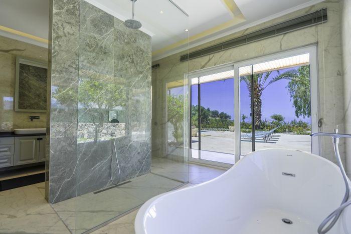 Immerse yourself in relaxation in our stunning bathroom featuring a luxurious hot tub.
