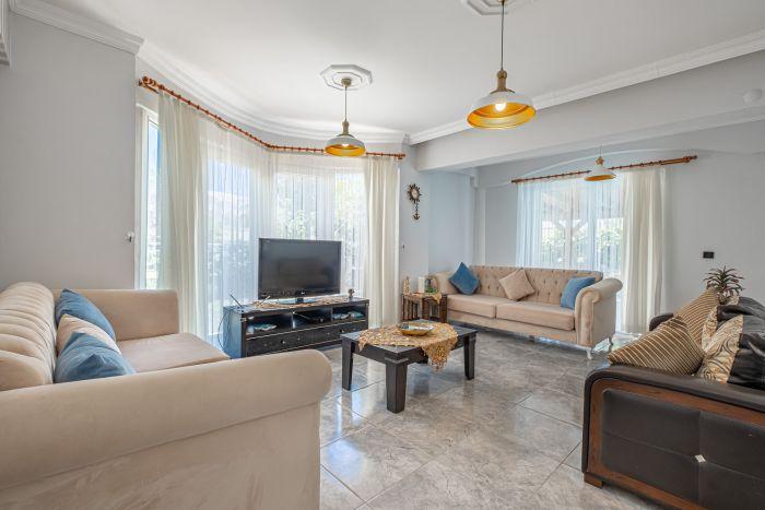 Relax and unwind in the comfort of our stylishly furnished living room.