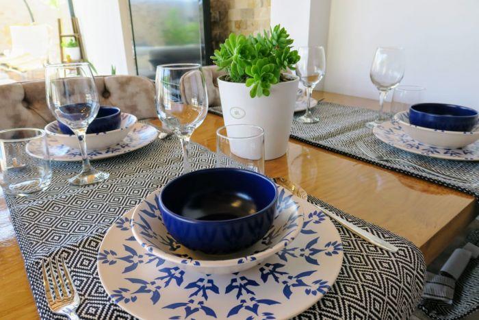 Our villa offers you a fine dining experience with this stylish dining table.