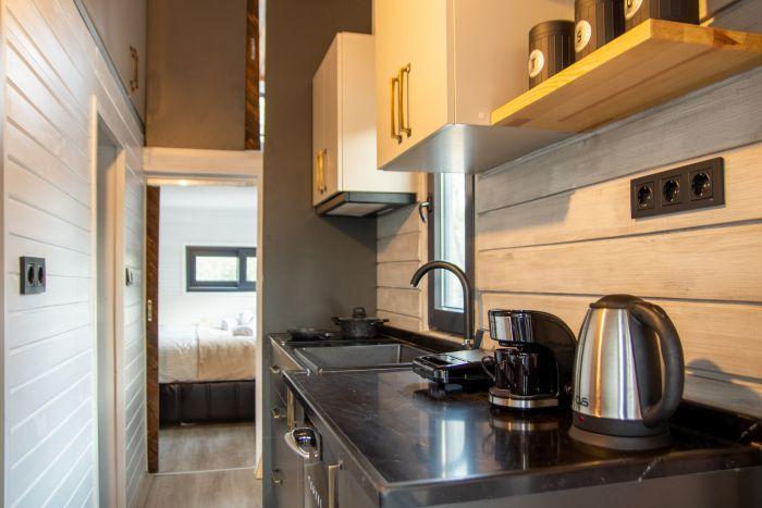 Our kitchen is well-equipped with modern appliances.