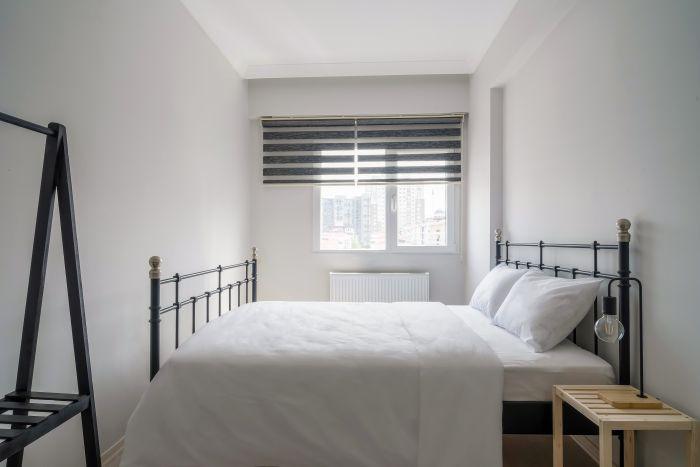 Take a look at the main bedroom, which boasts a spacious double bed