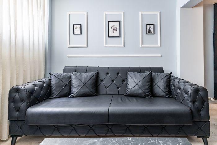 The gray couch looks so comfy and chic. 