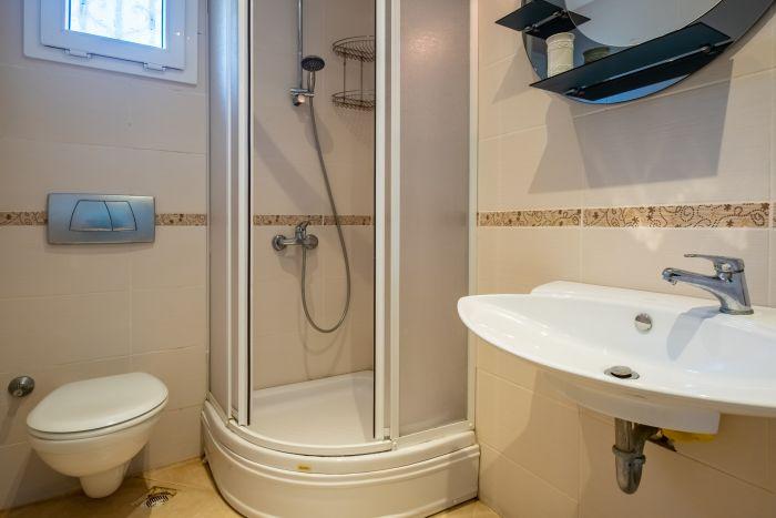 Additionally, the bathroom is equipped with hygienic appliances, prioritizing your comfort and cleanliness.