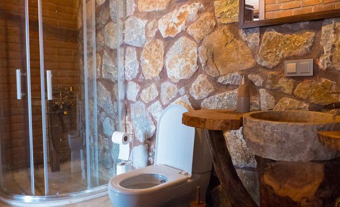 Even our bathroom will leave you astonished with its rustic style.